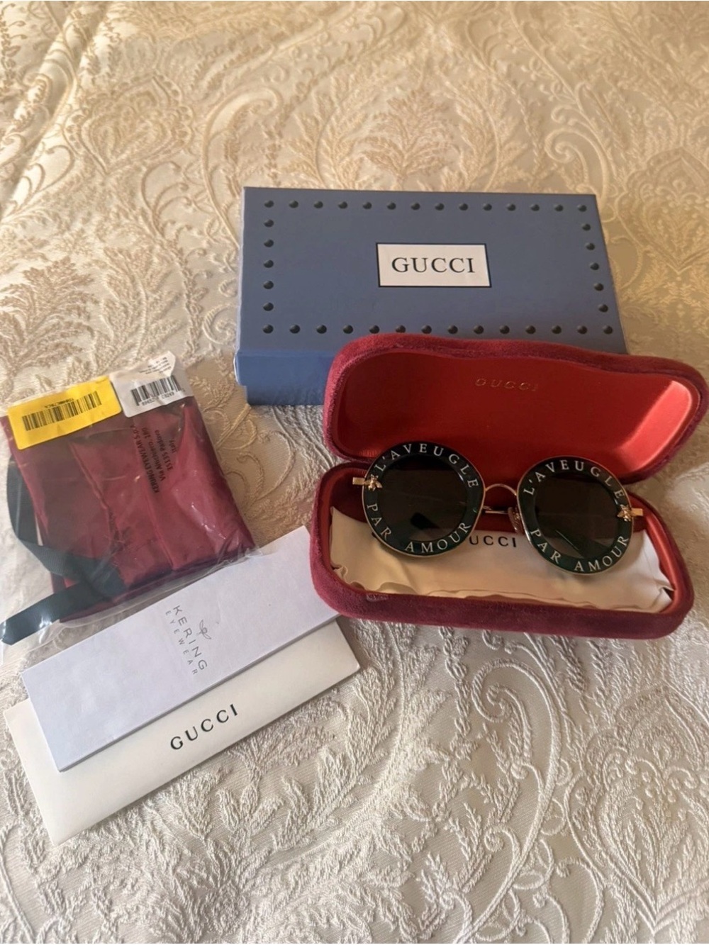 Gucci Women's Round Sunglasses with Dark Green  Lenses and Gold Accents